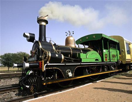 The Fairy Queen engine, the world's oldest working locomotive, is pictured at a railway platform in the desert Indian state of Rajasthan March 28, 2010. REUTERS/Vijay Mathur (INDIA - Tags: TRAVEL TRANSPORT)